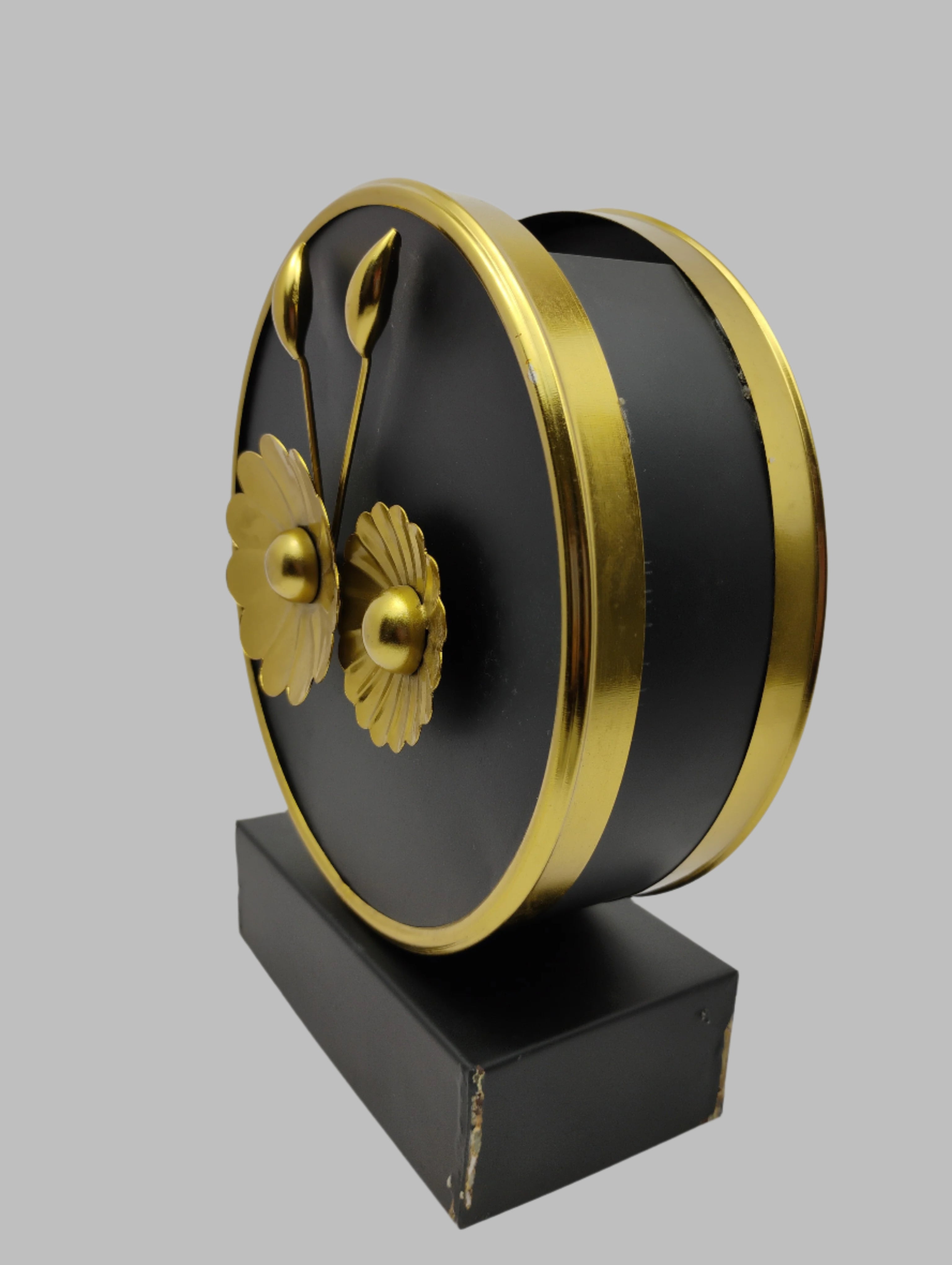 Gold Floral Vase Emblem on Black