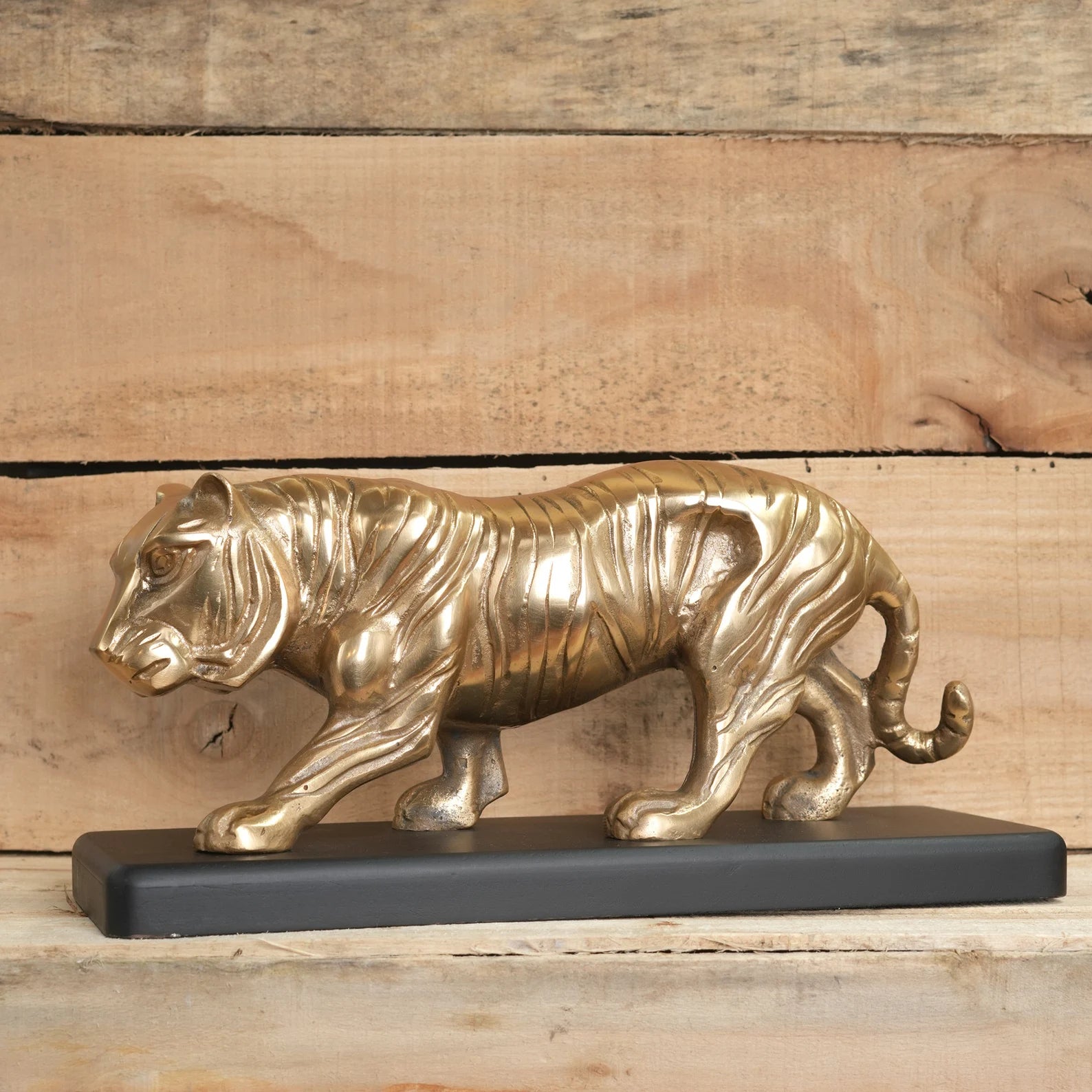 Majestic Tiger Sculpture on Black Wooden Base