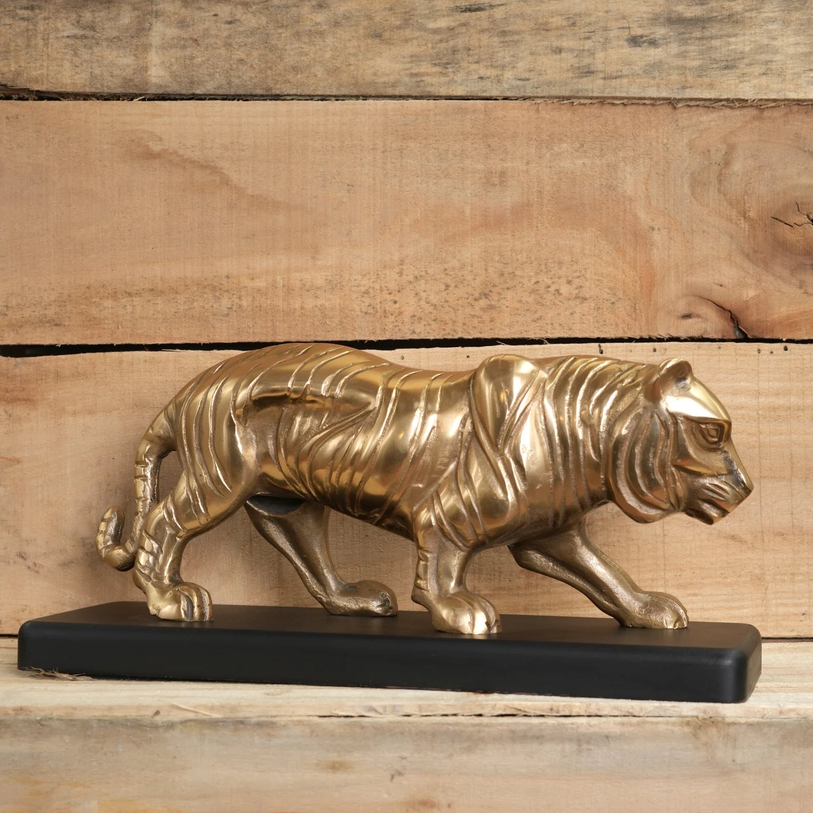 Majestic Tiger Sculpture on Black Wooden Base