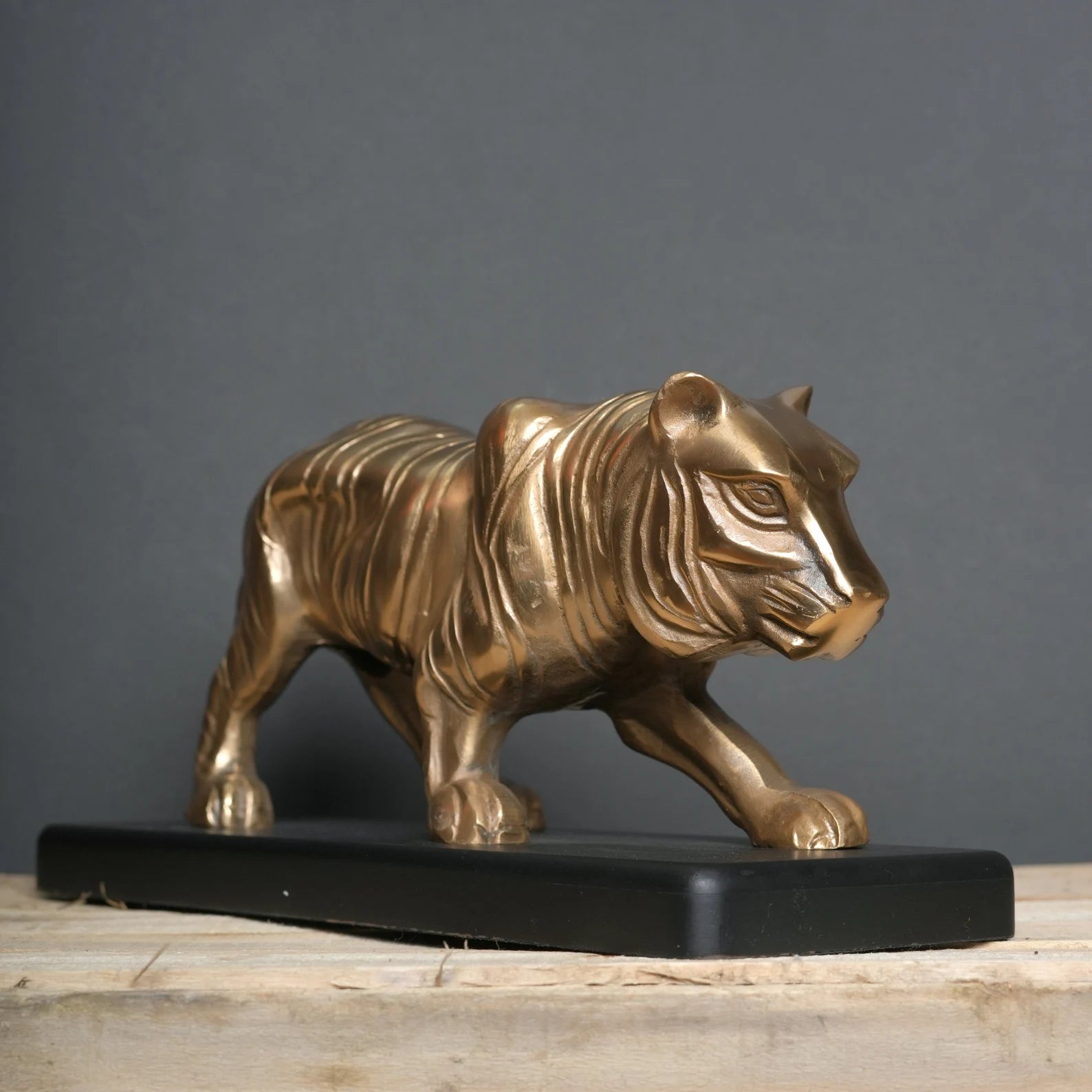 Majestic Tiger Sculpture on Black Wooden Base