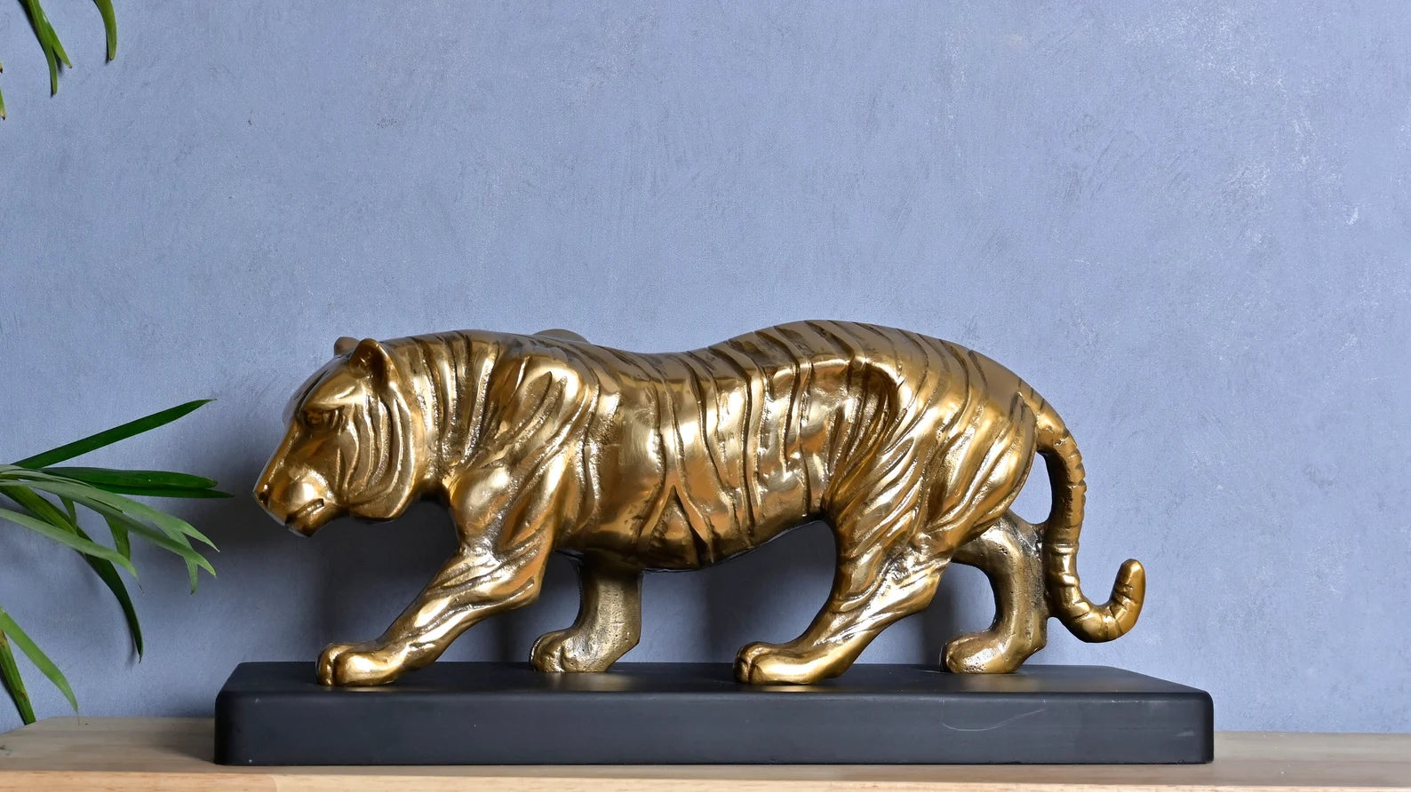 Majestic Tiger Sculpture on Black Wooden Base
