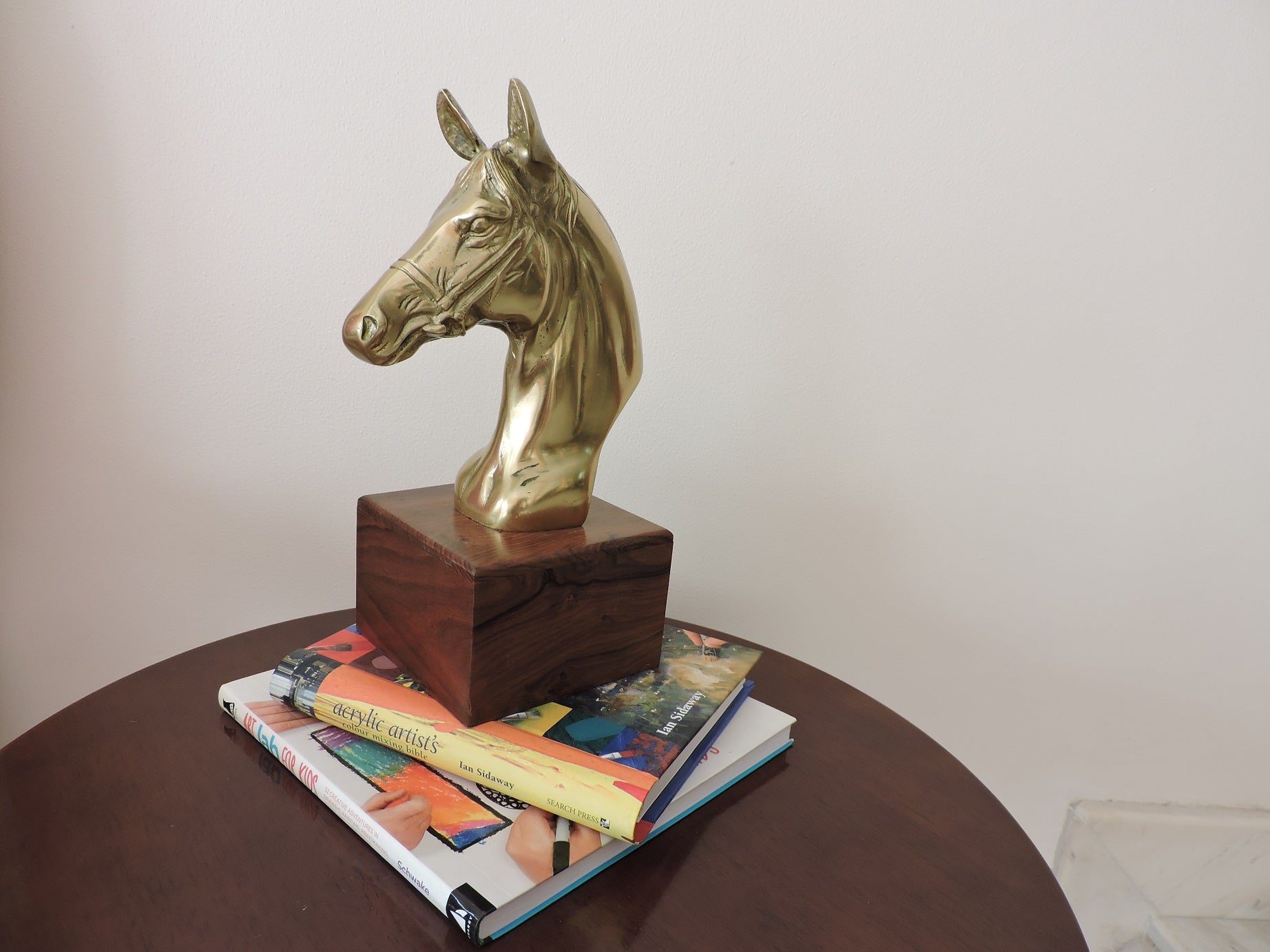 Horse head with wooden base